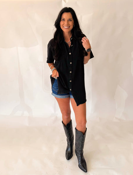 Rodeo grounds black top with concho buttons