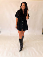 Rodeo grounds black top with concho buttons
