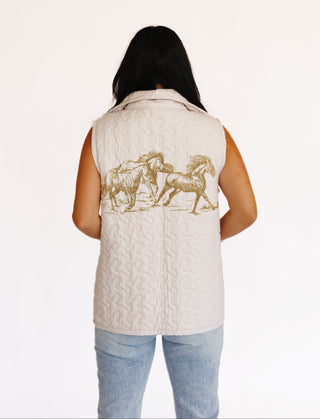 Abby quilted vest with horses on the back