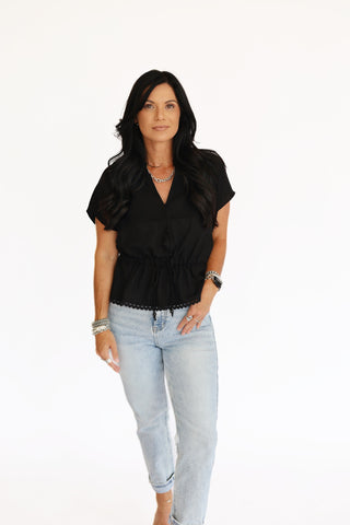 Bella black blouse with crochet detail
