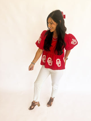 Sequin OU peplum top with pearl detail