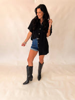 Rodeo grounds black top with concho buttons