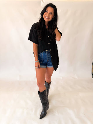 Rodeo grounds black top with concho buttons