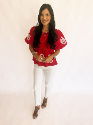 Sequin OU peplum top with pearl detail