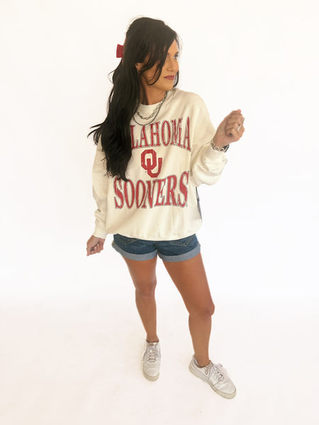 Oklahoma Sooners sweatshirt with stars on the sleeve