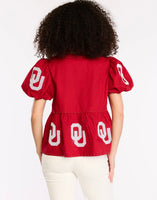 Sequin OU peplum top with pearl detail