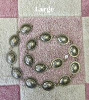 Nickle concho belts